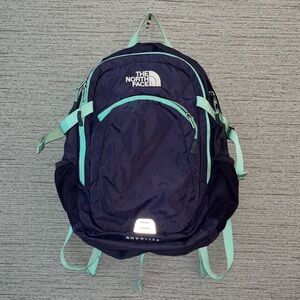 The North Face Rhyolite Backpack in Plum and Mint